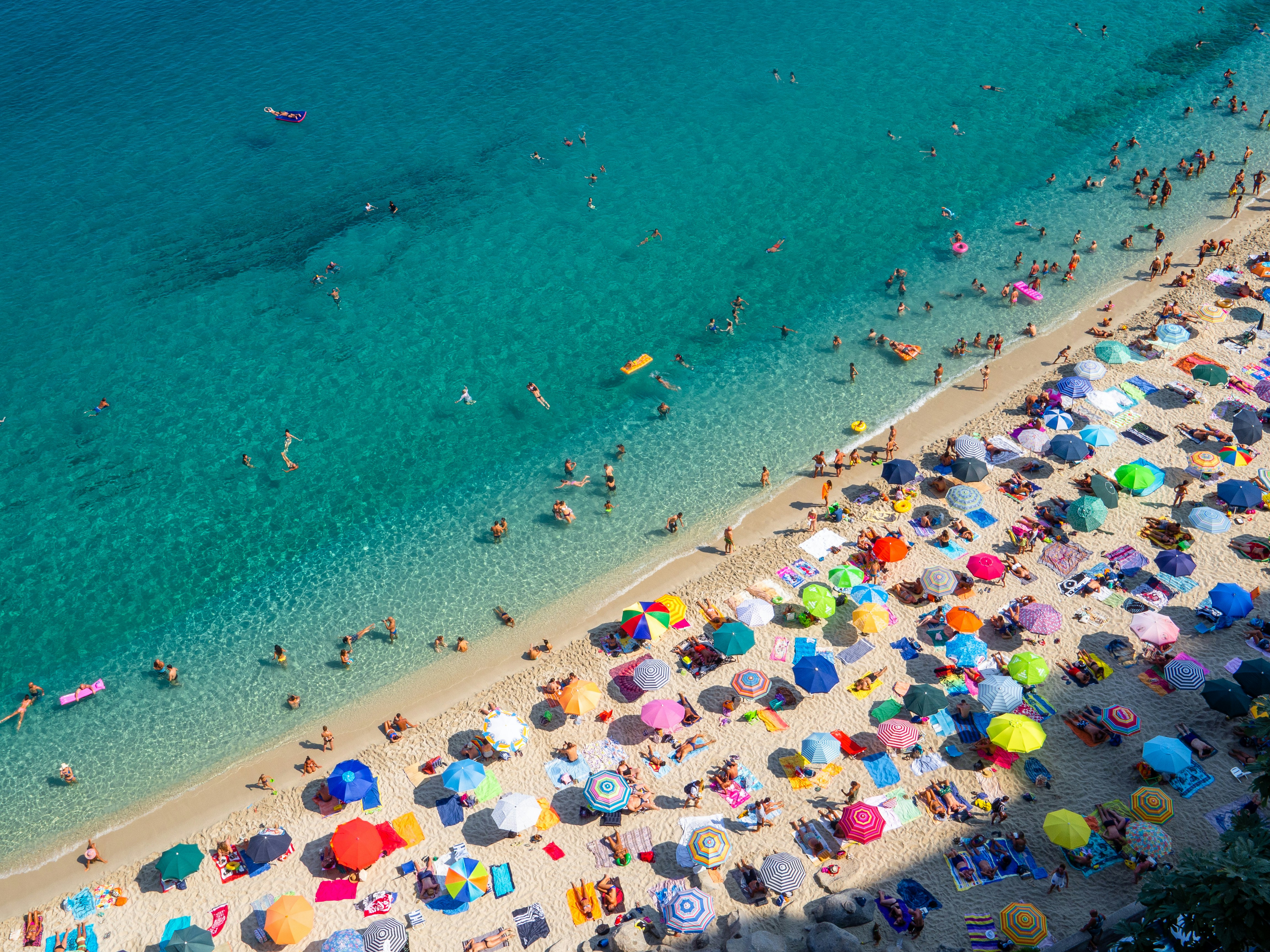 people in overcrowded beach