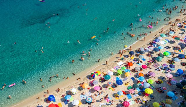 people in overcrowded beach